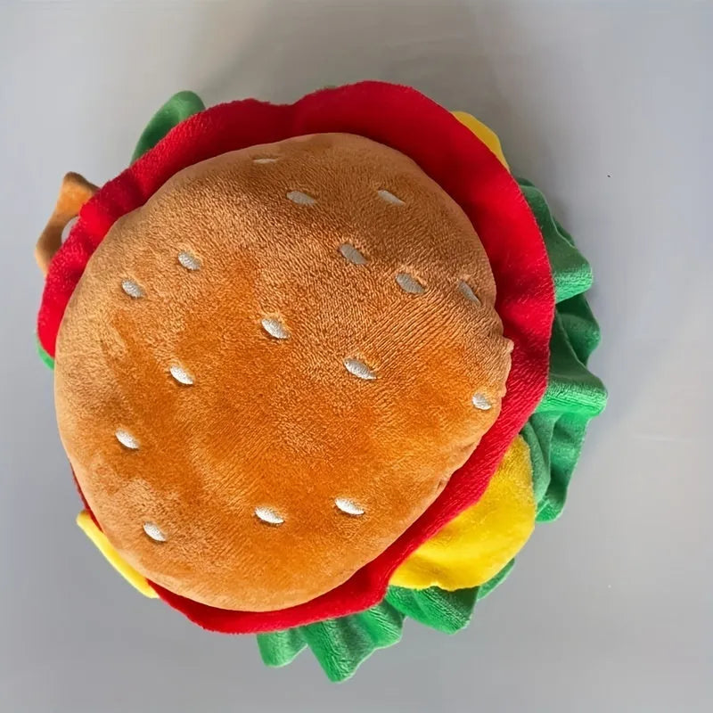 Cartoon burger-shaped headdress with cat cone silhouette on a feline, showing adjustable neck strap.