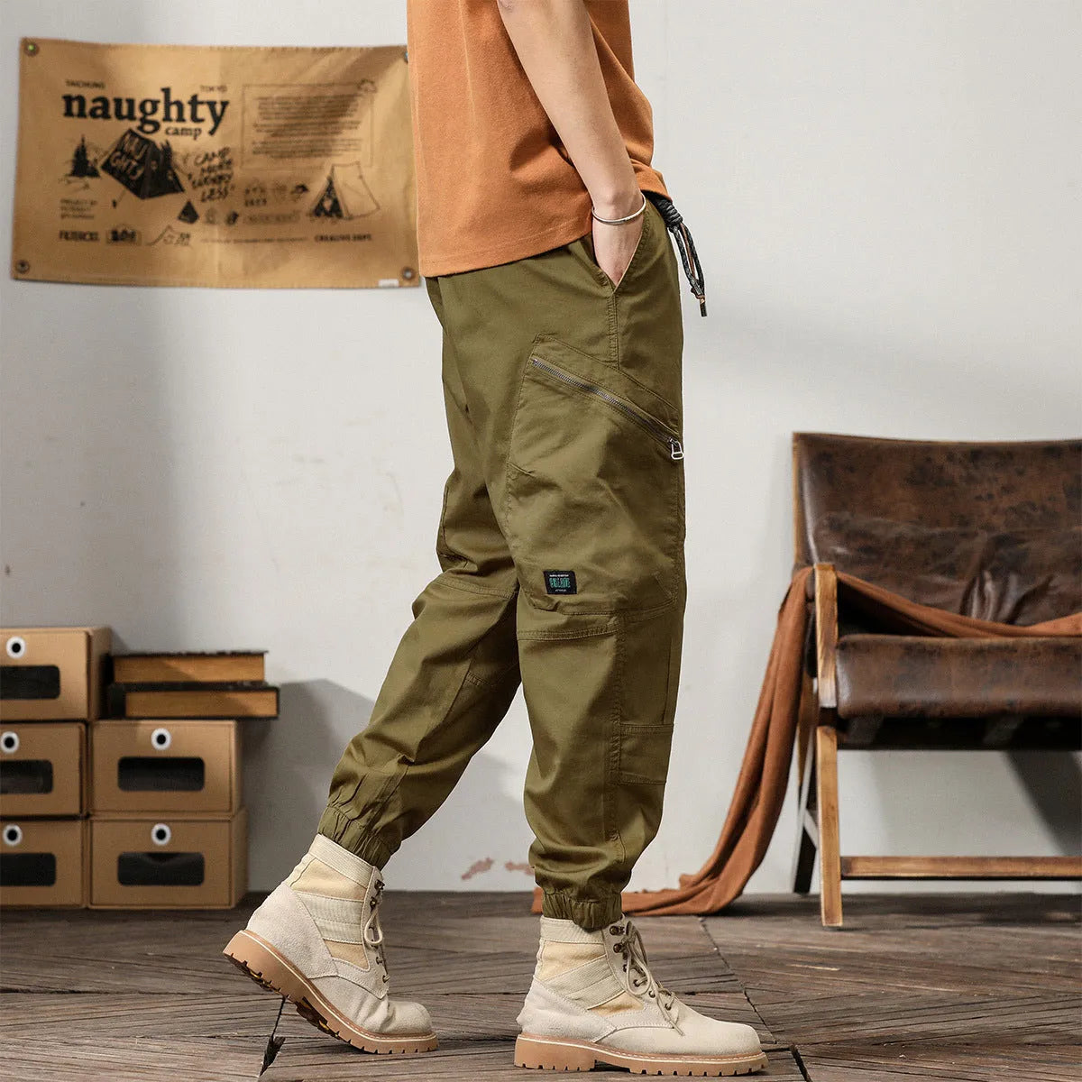 Men's loose-fit cotton harem pants in a solid colour with ankle bands and a mid waist.