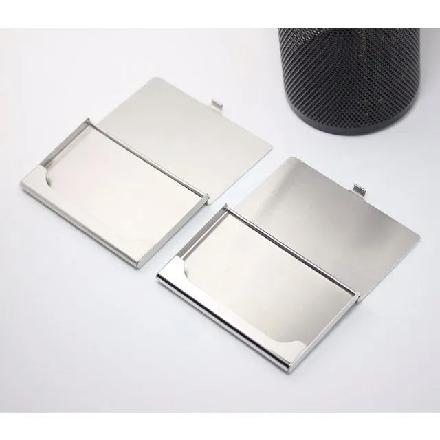 Geometric stainless steel business card case showing bevel, brushed, and mirror finish options.