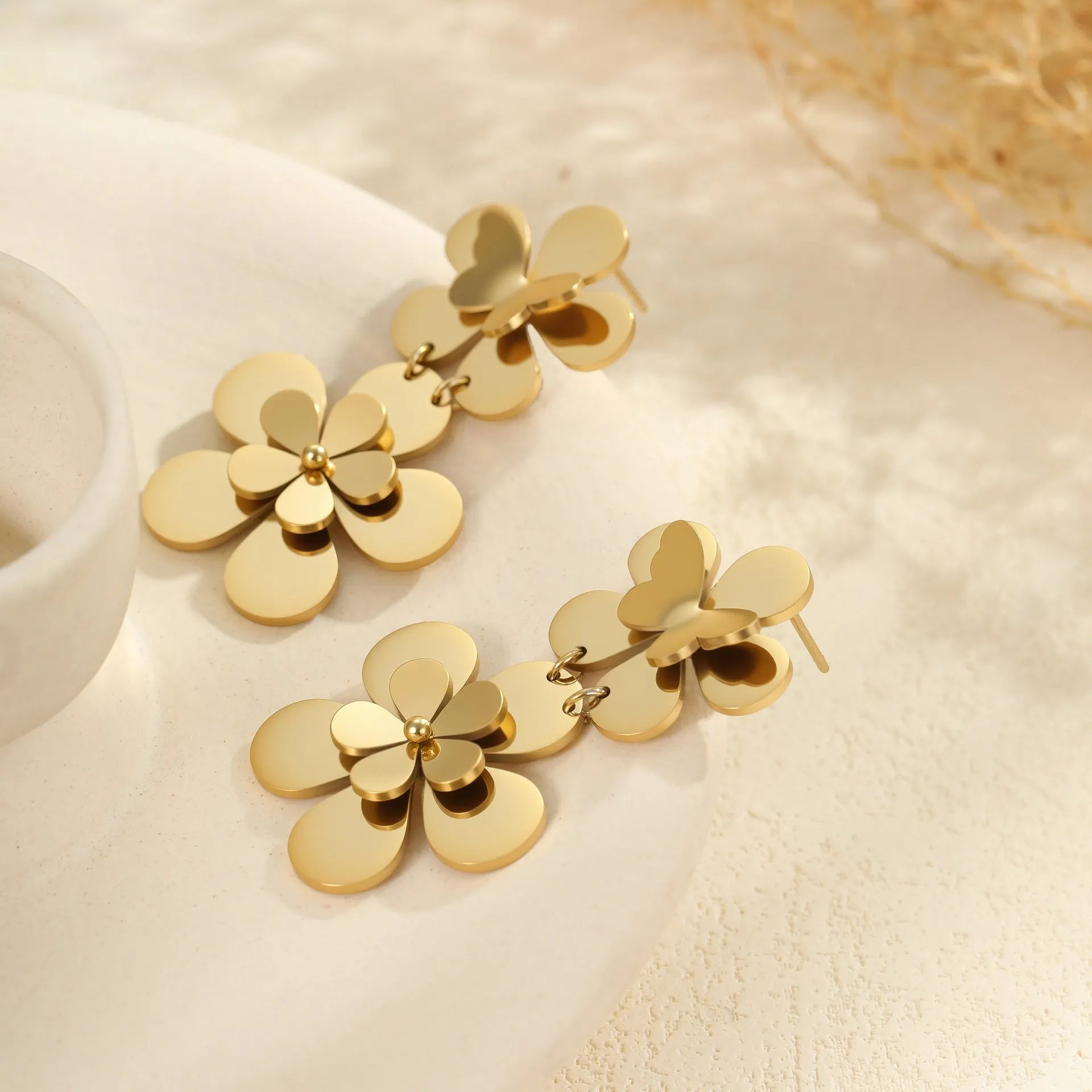 Women's stainless steel earrings with flower butterfly design in electroplated 18K gold colour
