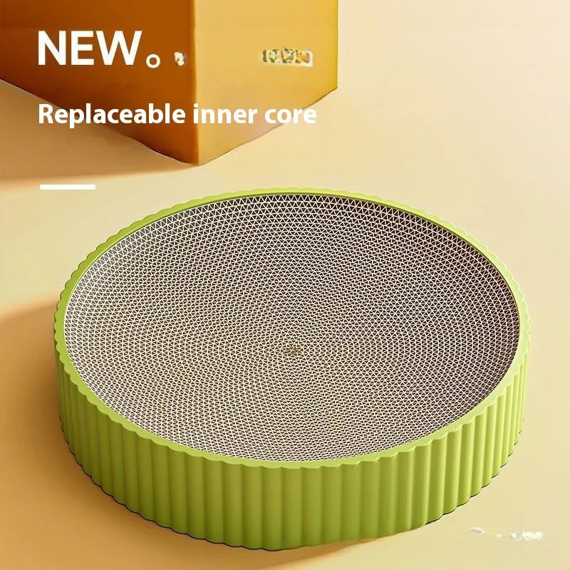 Round green cat scratching board and nest with replaceable corrugated cardboard surface, 55 cm diameter.