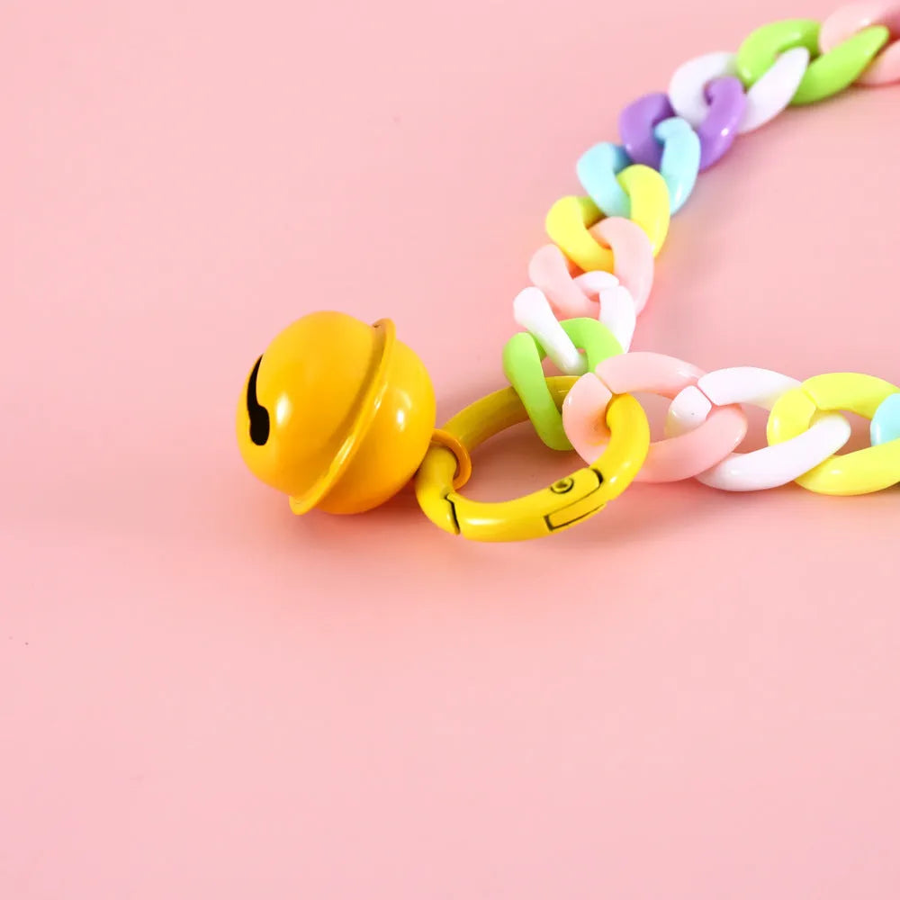 Macaron candy coloured plastic pet collar for cats, dogs, or rabbits on a chain.