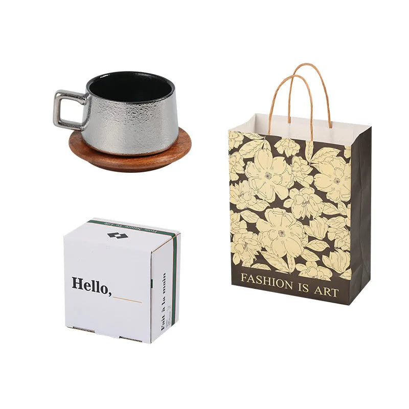 250ml solid colour tumbler cup inside a gold plated gift box with a matching gift bag.
