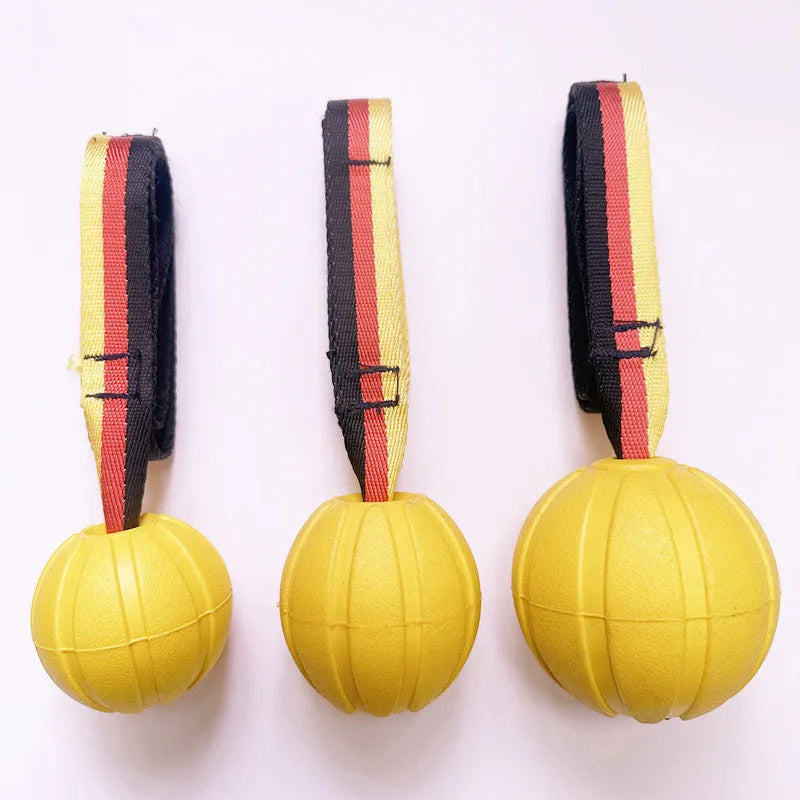 Floating EVA pet string ball in camouflage or yellow colour with attached string for water retrieval games