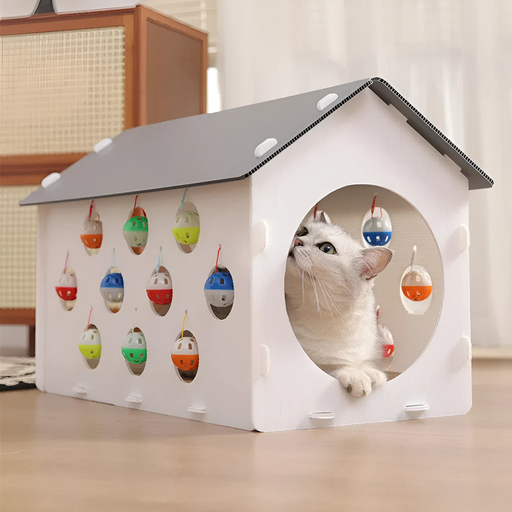 Integrated cat scratch board and nest toy with bell ball and tunnel features