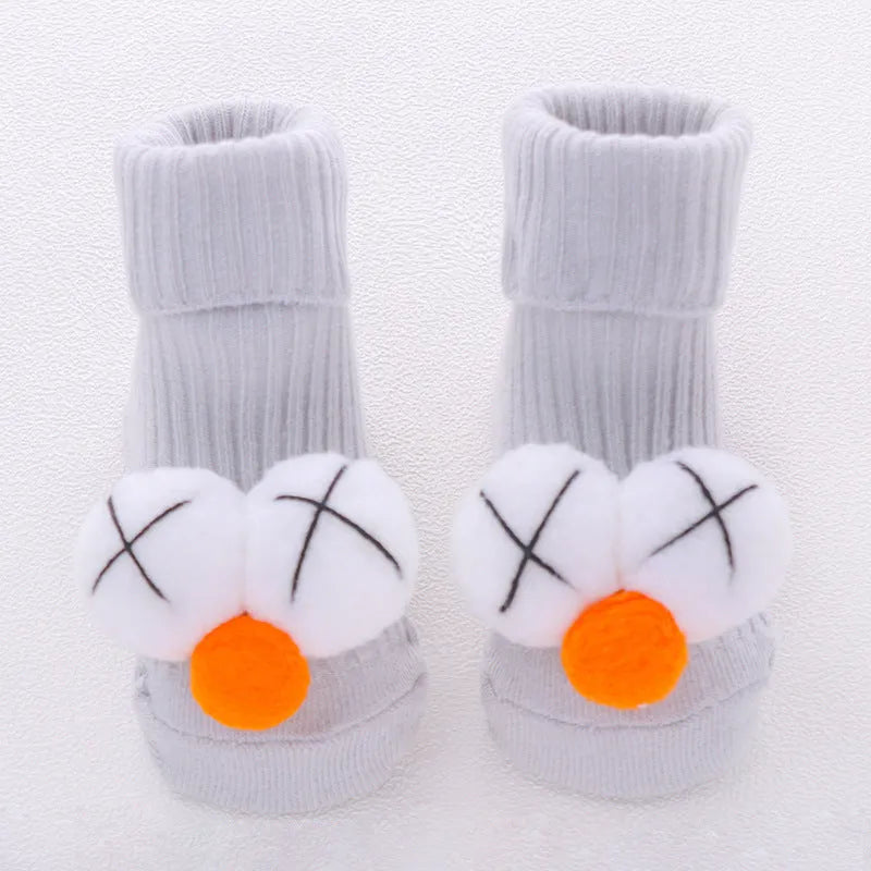 Cotton baby floor socks with anti-slip soles in animal designs for infants and toddlers