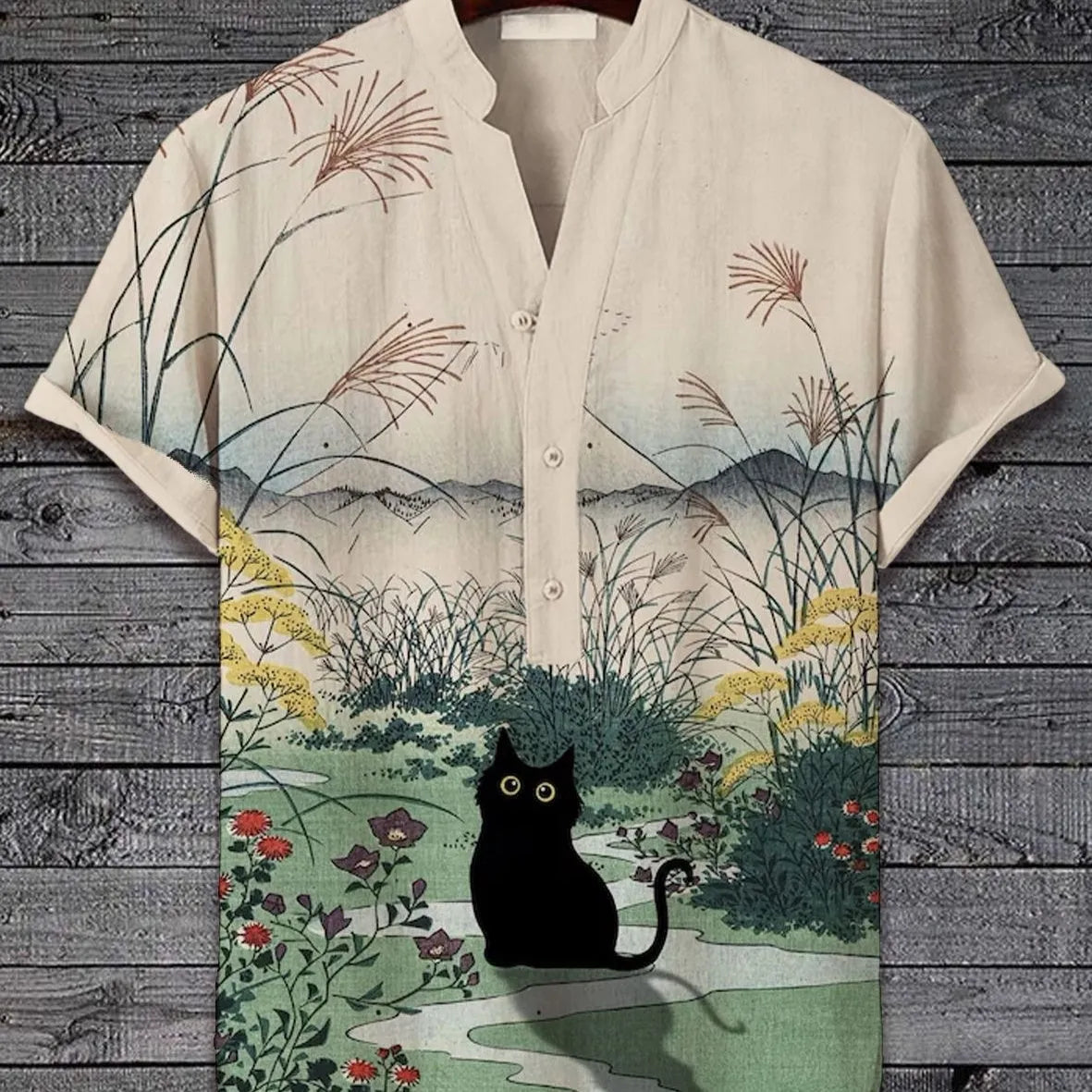 Man wearing a short sleeve t-shirt with a colourful 3D digital animal graphic print on the front.