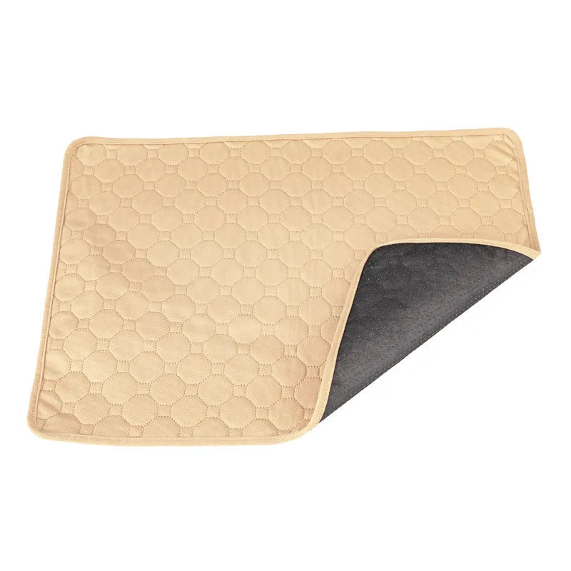 Washable dog pee pads in neutral tan and grey colours measuring 18x24 inches