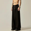 Men's black vertical tube wide-leg trousers showing cotton blend fabric texture and straight-leg silhouette