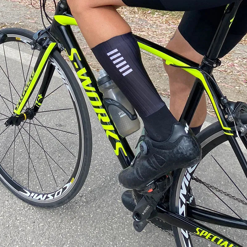 A pair of athletic sports socks for cycling and running, shown in one of six available colours.
