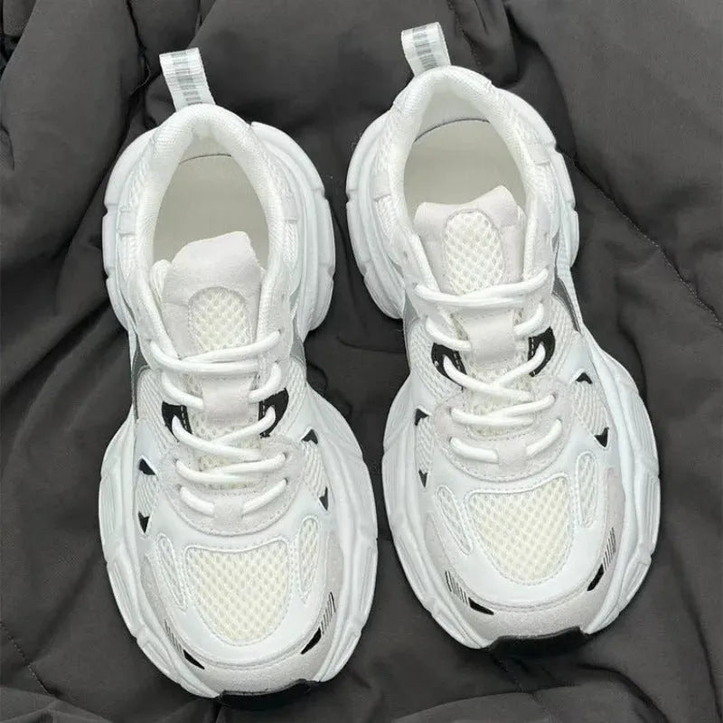 Beige mesh sports shoes with wedge heel and lace-up front on rubber sole