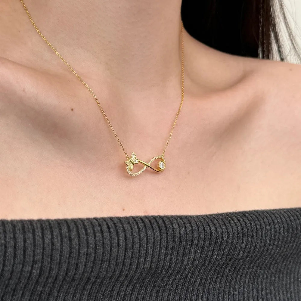 925 sterling silver Mobius bow zircon clavicle chain in gold or platinum finish with butterfly detail