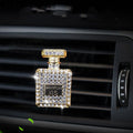 Gold alloy car air freshener holder in perfume bottle style, approx. 4.7cm x 3cm, for fragrance tablets