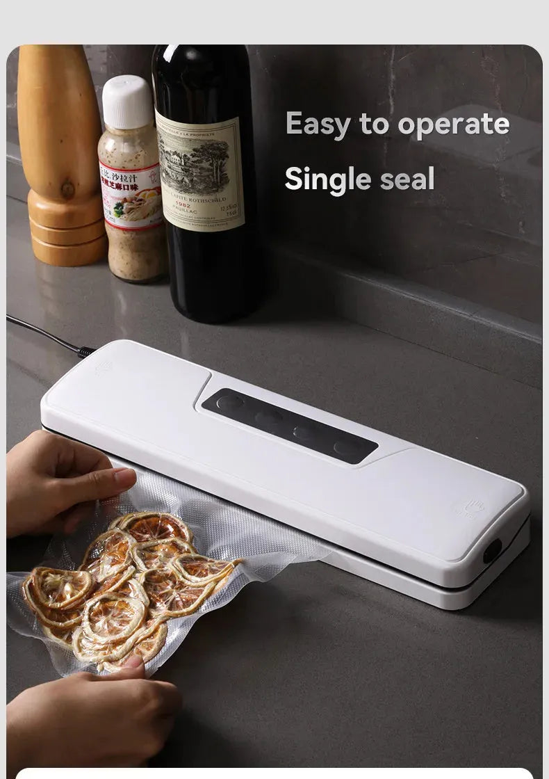 Small white automatic vacuum sealer machine for household food preservation and item protection