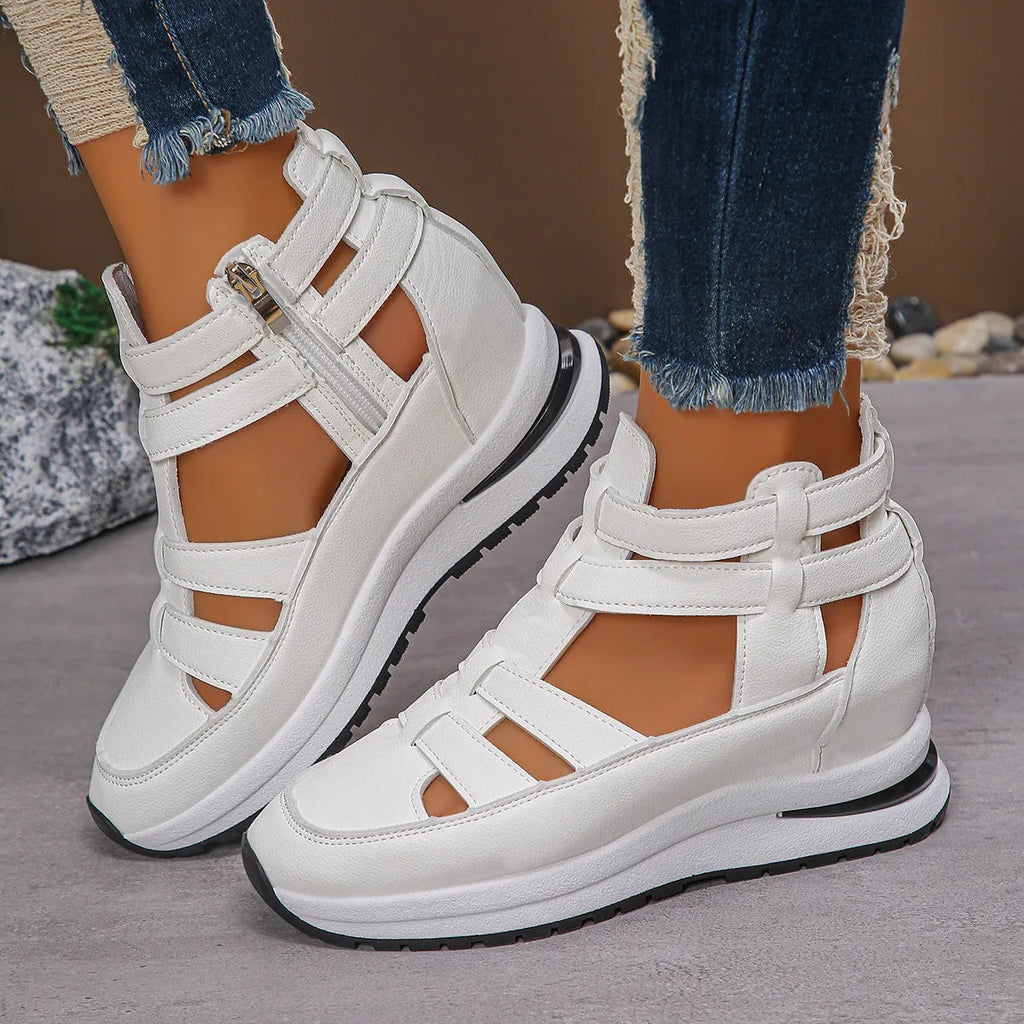 Women's black hollow-out platform sandals with a Velcro strap and round toe.