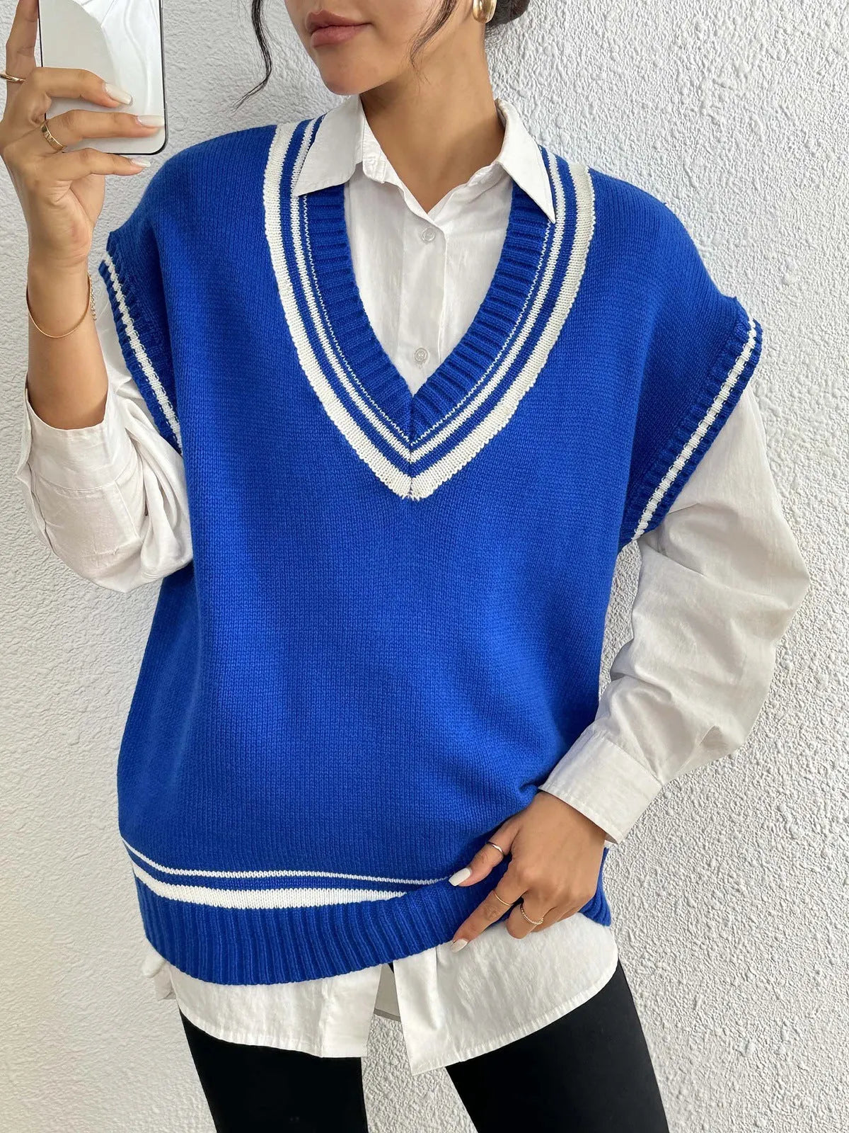 Women's blue college style acrylic polyester vest sweater with loose fit design
