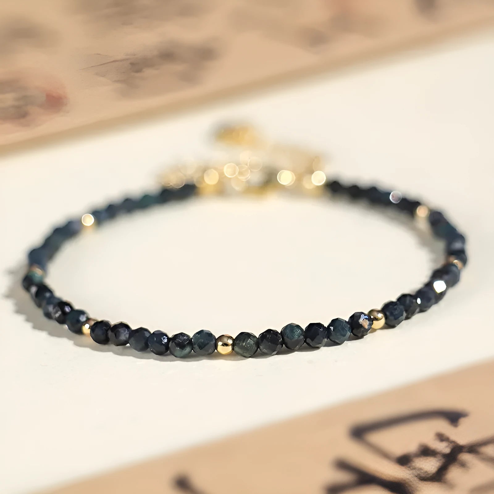 Close-up of a blue tourmaline and spacer bead bracelet for women.