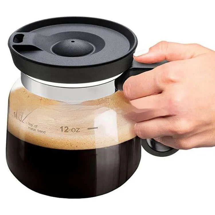 Transparent borosilicate glass coffee maker with silicone cover showing 355-473ml capacity markings