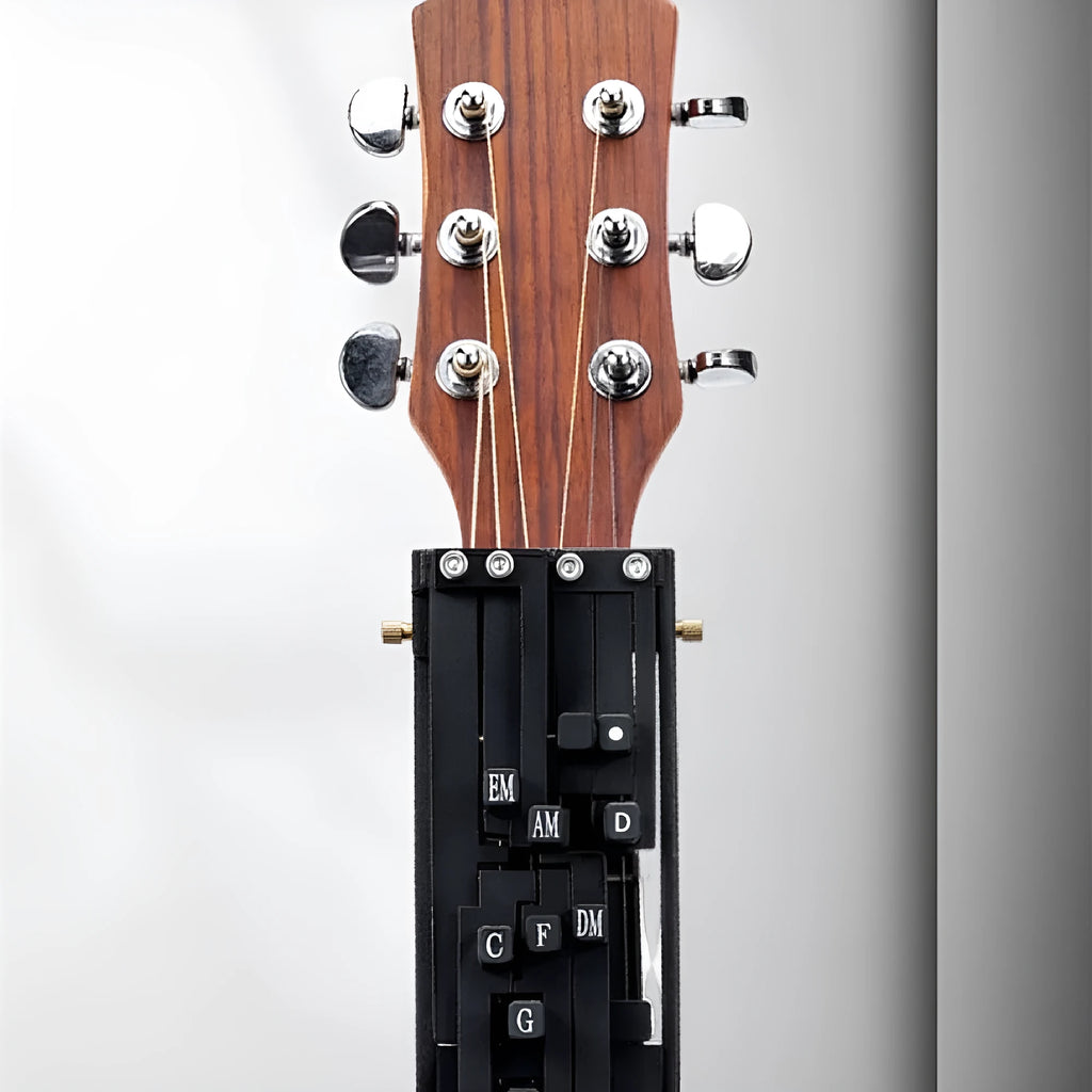 Black automatic guitar chord capo device on guitar neck for beginner practice