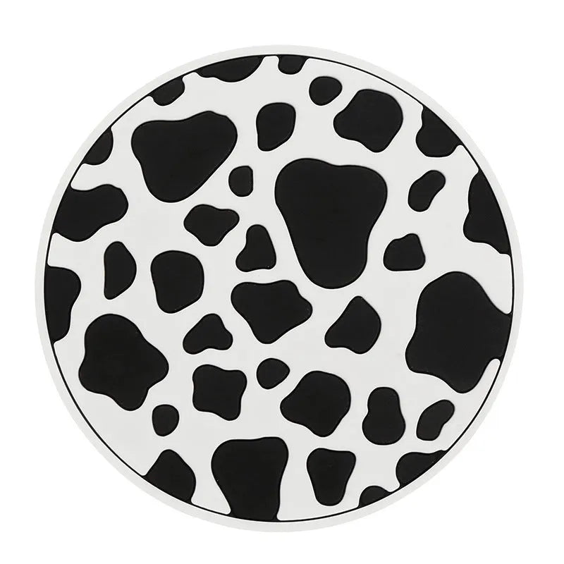 Plastic universal car cup holder mat in a black and white checkerboard pattern
