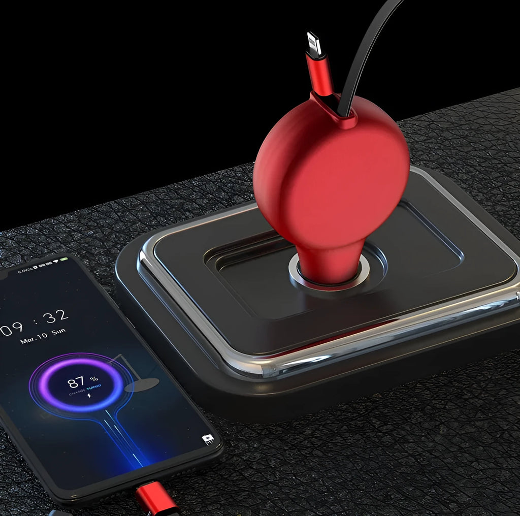 Black retractable car charger unit with two extended cables plugged into a vehicle's 12V socket.