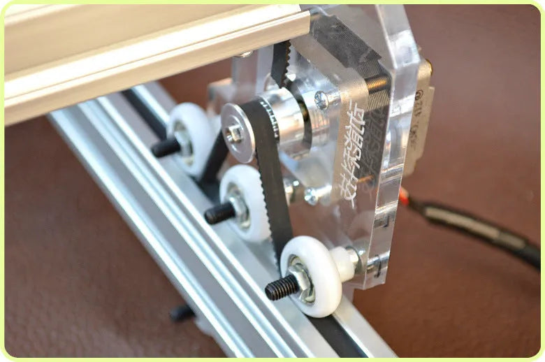 Miniature desktop laser engraving machine with a 400mm by 300mm base plate.