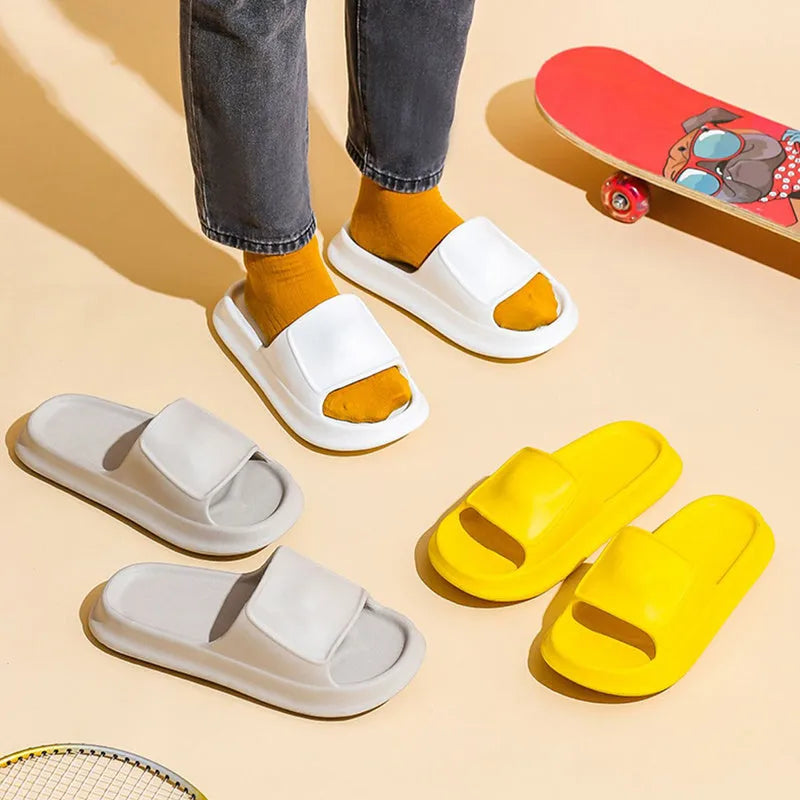 Pair of thick-soled EVA foam slippers in a choice of seven colours, showing non-slip textured sole.