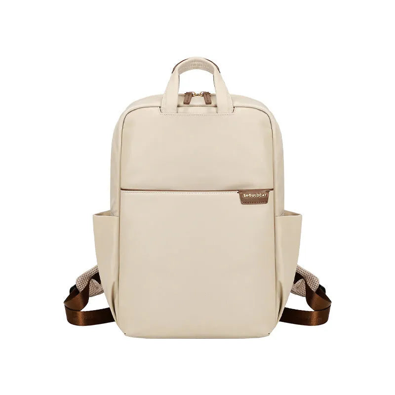 Women's nylon backpack in apricot colour with laptop compartment and organisational pockets