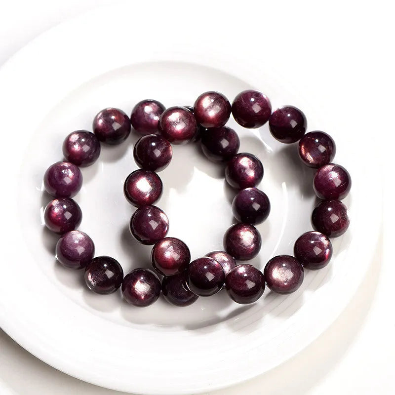 Natural purple lepidolite crystal bracelet with polished round beads in geometric design showing size options