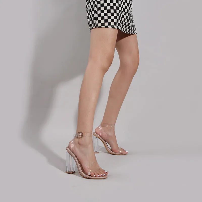 Apricot women's high-heel sandals with clear glass heel and buckle fastening on a round toe