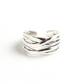 Close-up of a women's S925 sterling silver ring with a vintage weave pattern and retro silver finish.