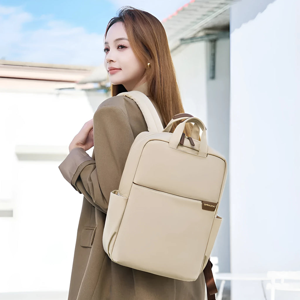 Women's nylon backpack in apricot colour with laptop compartment and organisational pockets