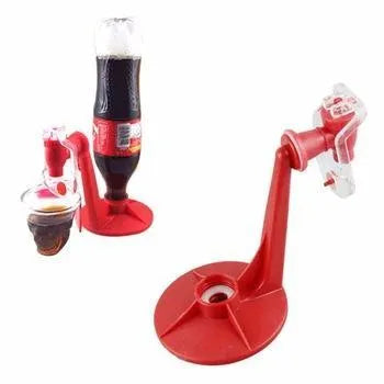 Red plastic soda dispenser attached to 2-litre bottle showing push-button mechanism