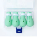 Four silicone cat paw covers for anti-scratch protection during grooming and care