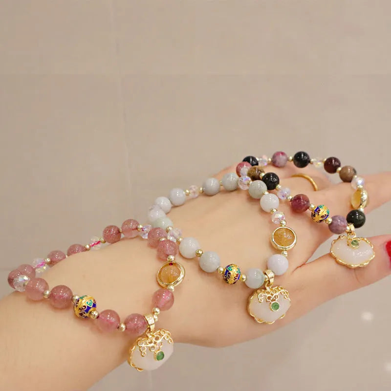 Geometric women's bracelet with grey jade and strawberry quartz stones and metal accents