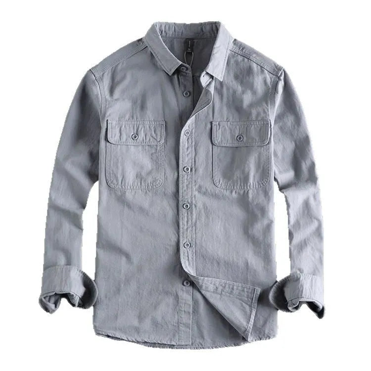 Man wearing a loose-fit light grey polyester cardigan shirt with long sleeves and an overalls design detail.