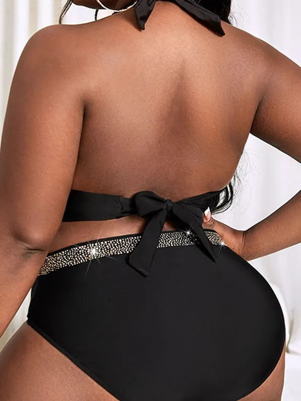 Black plus size women's bikini swimsuit showing bra and shorts components