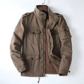 Men's loose fit cotton twill jacket in light coffee colour with zip front, shown on a hanger.