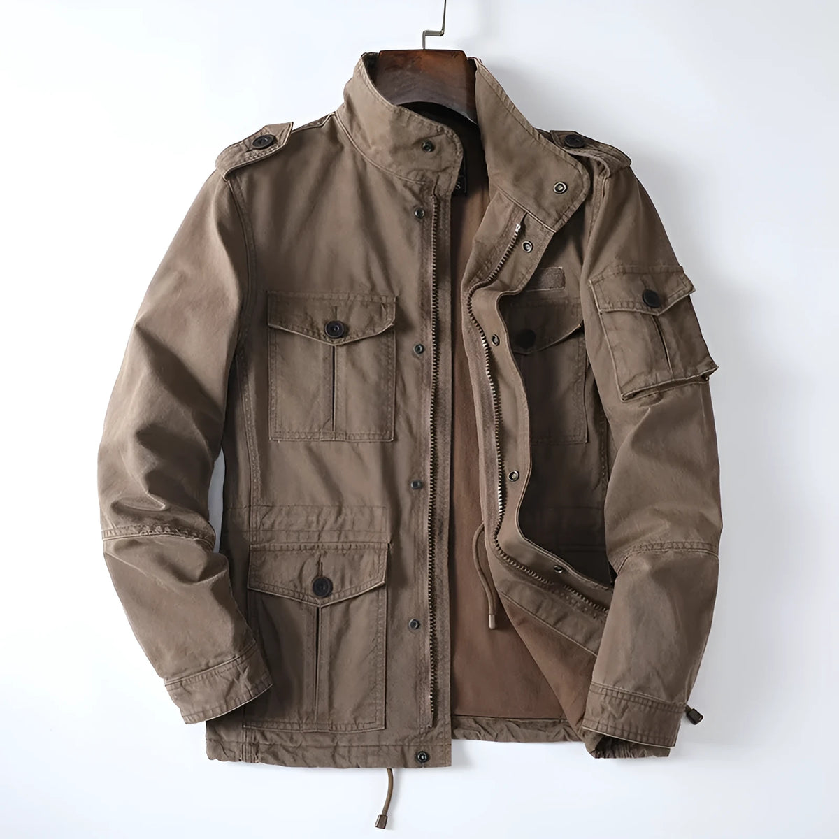 Men's loose fit cotton twill jacket in light coffee colour with zip front, shown on a hanger.