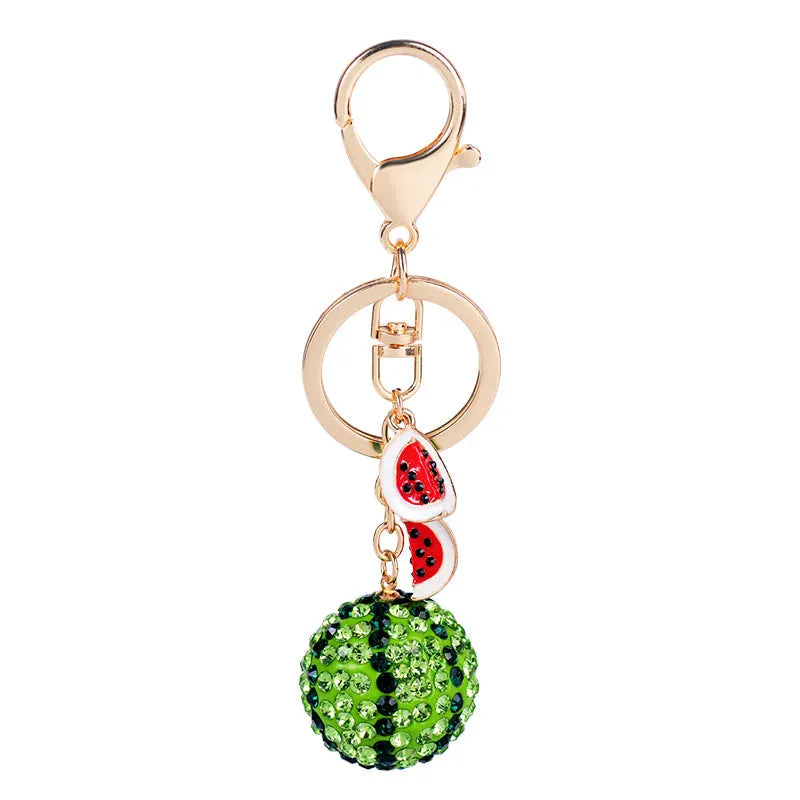 Green watermelon-shaped zinc alloy keychain measuring 12cm with fruit design details