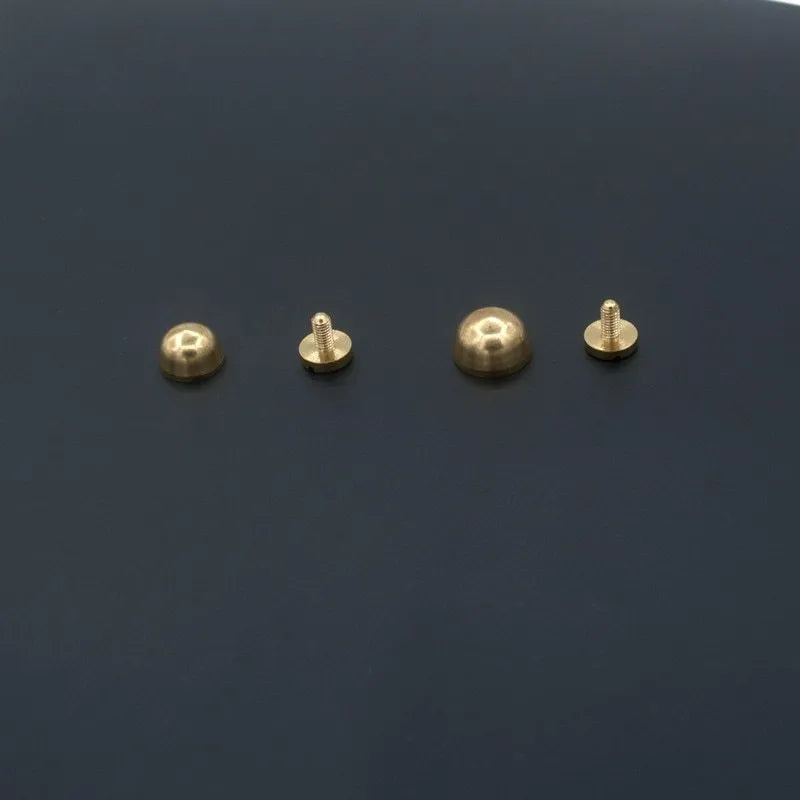 Brass decorative belt buckle showing round and bucket foot nail shapes in 10x6mm and 12x7mm sizes.
