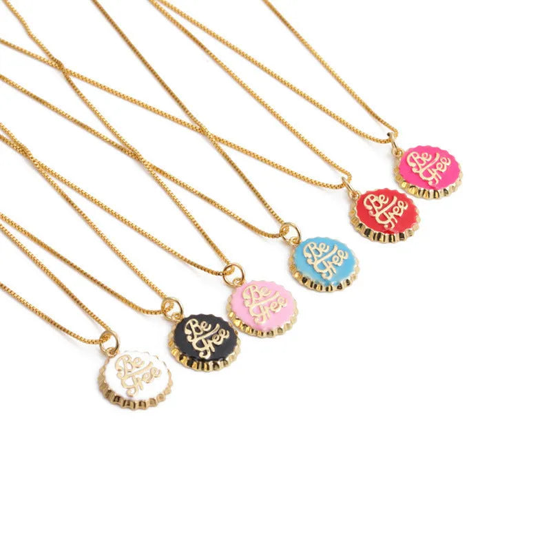 Copper bottle cap pendant necklace on a 40cm box chain with 18K gold electroplating.
