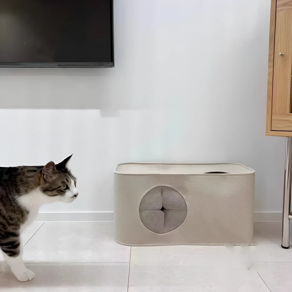 Grey foldable felt cat nest bed shown next to a khaki one, demonstrating its soft structure.