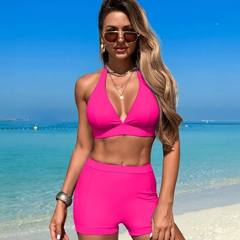 Women's sleeveless split bikini swimsuit in nylon with polyester lining available in black pink and blue