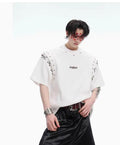 Black deconstruction lace-up cutout short sleeve summer t-shirt on mannequin showing side detail