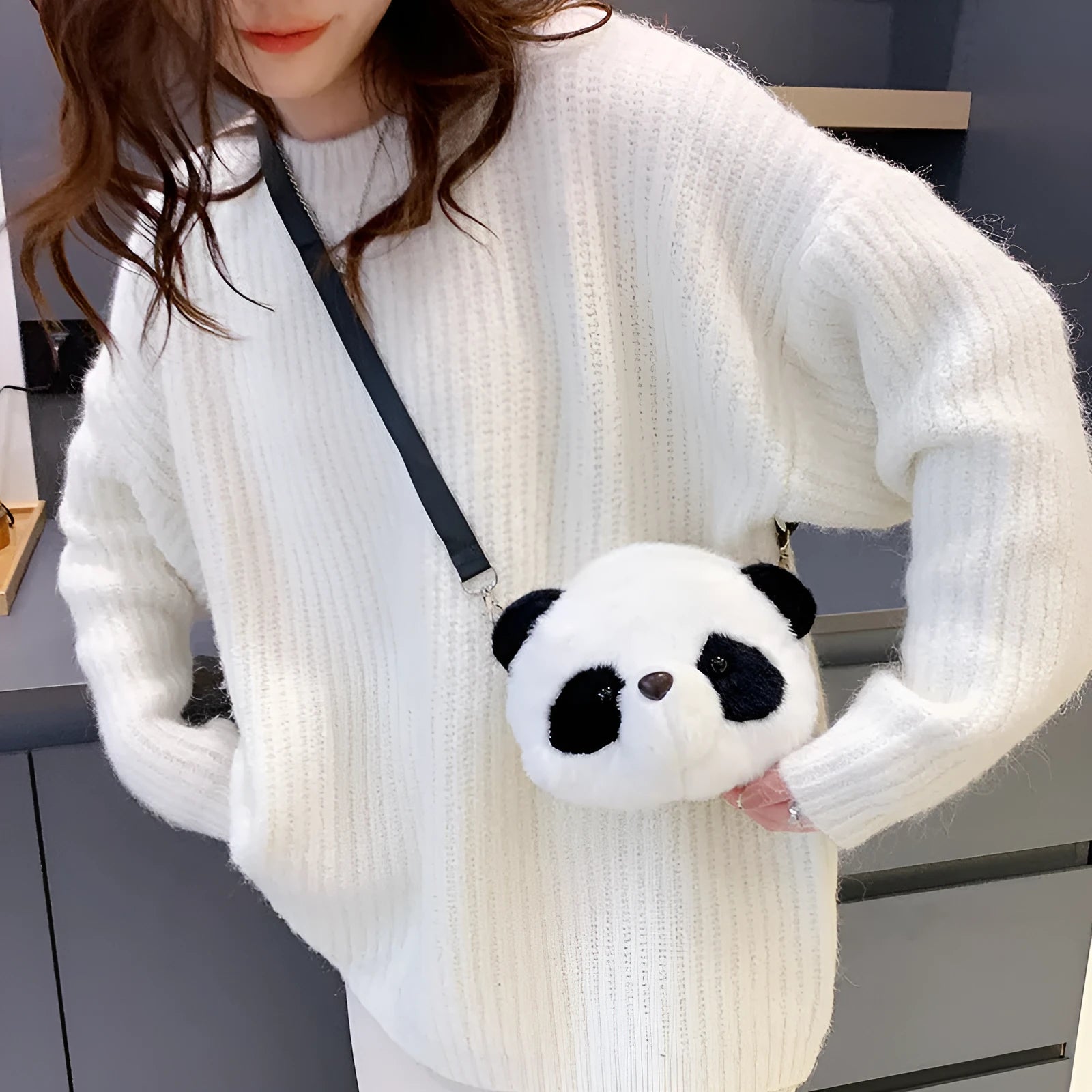 Plush panda head crossbody bag with cylindrical shape and sandwich pocket design