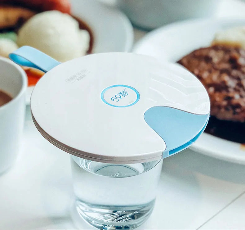 Blue portable UV baby bottle steriliser showing compact rectangular design with USB port