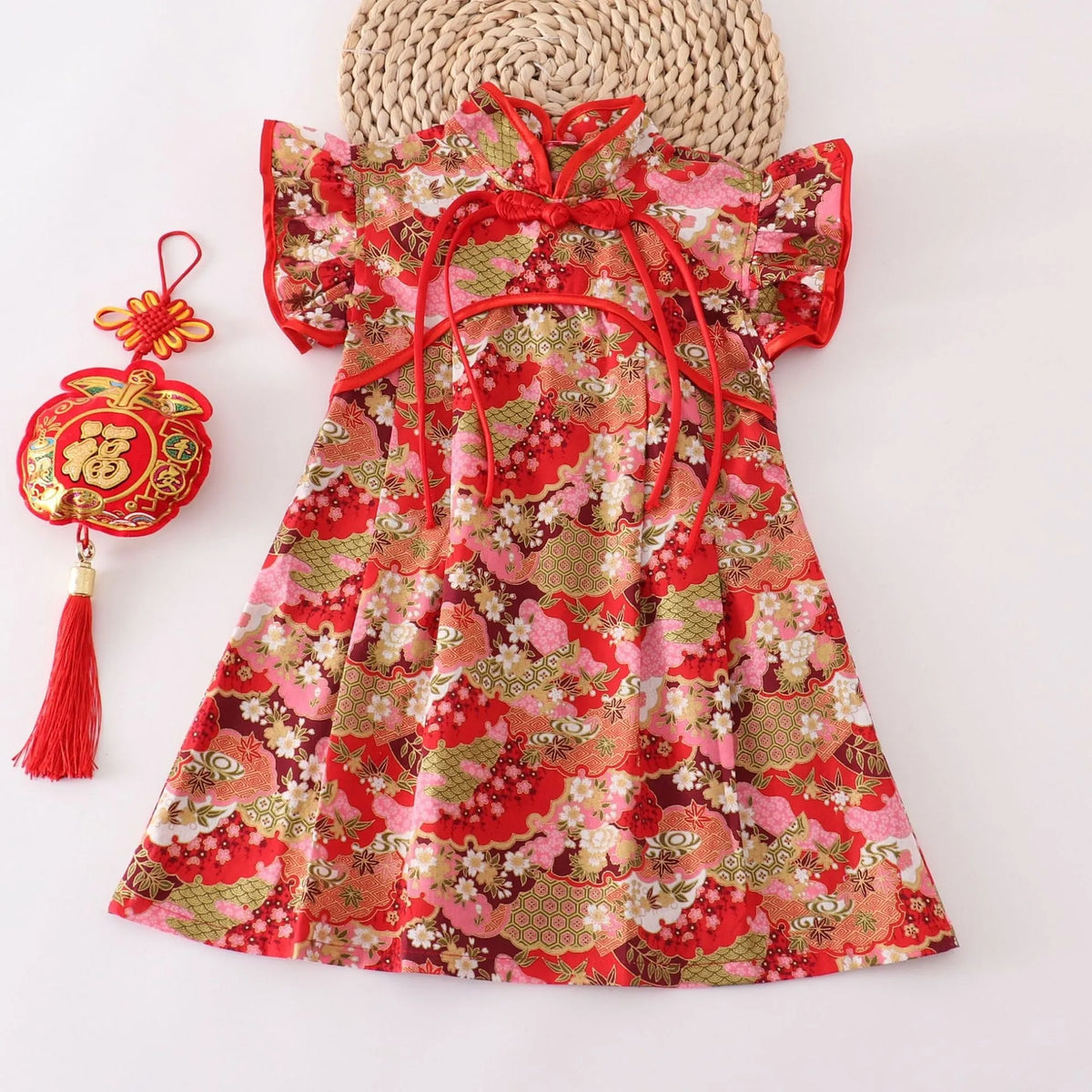 Girls Chinese style cotton dress in red small floral with splicing detail, available in heights 80cm to 150cm.