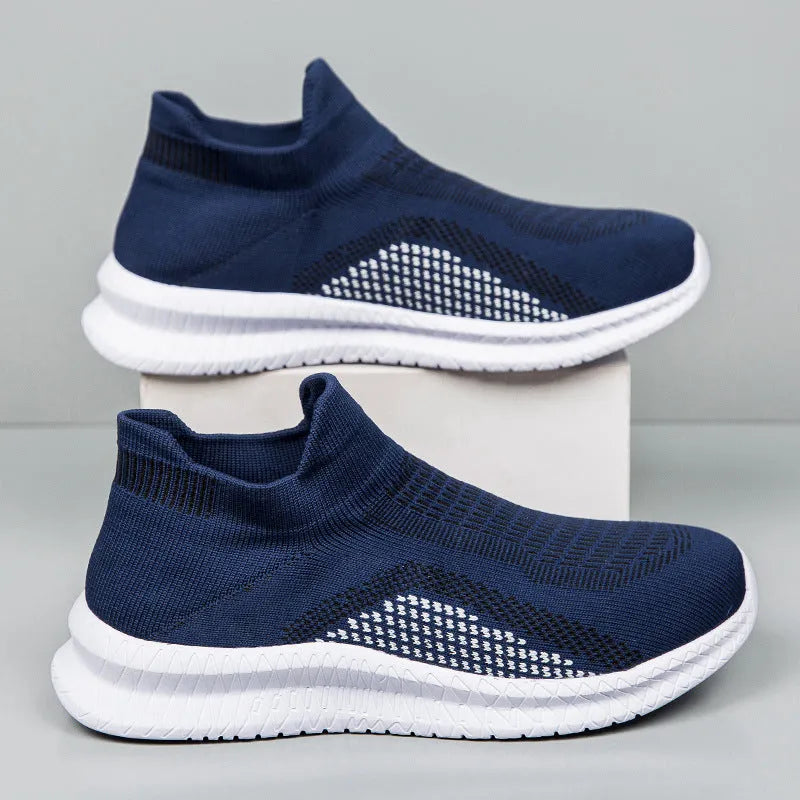 Men's low-top Flyknit popcorn stitch casual sneaker in blue, shown from the side.