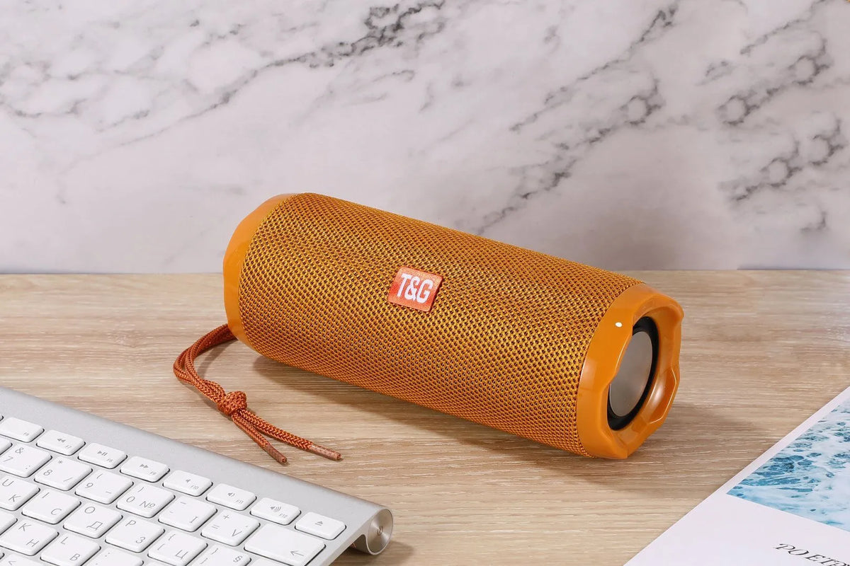 Portable Bluetooth speaker with card holder in multiple colour options including blue, black, and camouflage.